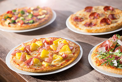 vier MUNDFEIN Pizzen